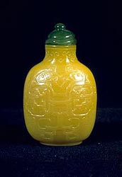 The 'Imperial Yellow' snuff bottle with archaic designs