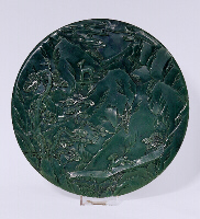 Reverse: Spinach green jade circular screen with figures in a mountain landscape. Qianlong period.