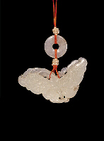 Nephrite Pendant, white carved in the form of a butterfly with long proboscis, the other side with a beetle amongst scrolling flowers and ruyi fungus.