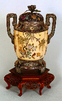 Reverse: Ivory shibayama style and enamelled silver Jar and Cover.