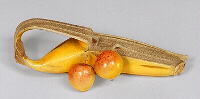 Ivory Okimono of a banana partially opened and with a pair of cherries. 