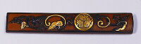 Shoami School kozuka: A gold aoi mon with shakudo and gold reishi fungus on a copper ground.