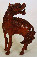 Prunus rootwood carving of a Kirin.