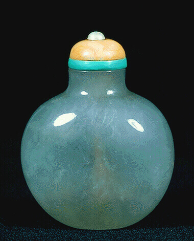 A flawless grey jadeite plain snuff bottle, superbly hollowed eggshell thin, with a pink coral on a turquoise collar with pearl finial stopper. 