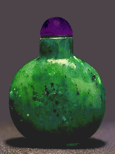 A plain mottled spinach nephrite snuff bottle, well hollowed, with an amethyst stopper. 