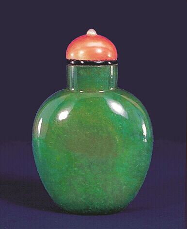 A bright apple-green jadeite plain snuff bottle. Not too heavy. Pink quartz stopper. 