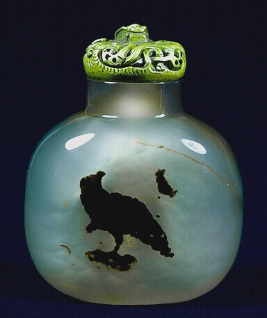 A chalcedony very well hollowed silhouette eagle picture snuff bottle. Metal (in the form of a dragon) stopper. 