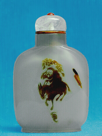 A chalcedony well hollowed silhouette Huang Chenyen picture snuff bottle with a crystal stopper.