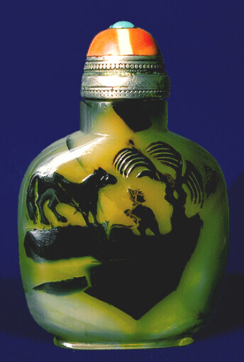 A chalcedony well hollowed silhouette horse and farmer picture snuff bottle with a coral and metal stopper. 