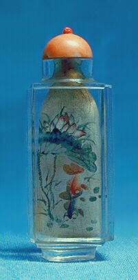 Quartz, crystal snuff bottle, painted inside in ink and colour with a continuous aquatic scene of a fan-tailed carp swimming amongst lotus.