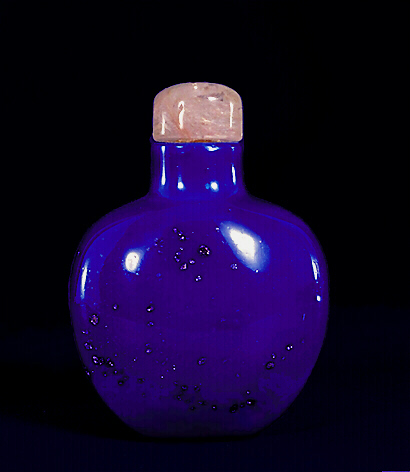 Glass snuff bottle, bright blue colour with small speckled inclusions of gold stone glass, possibly imitating lapis lazuli.