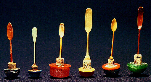 A small selection of stoppers and spoons from this collection. 