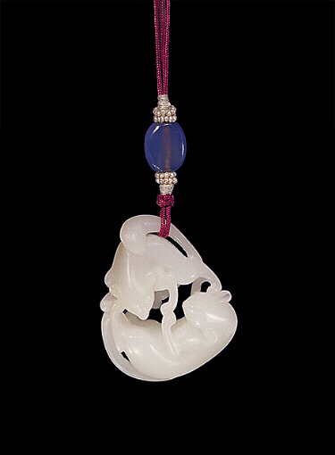 Nephrite Pendant, mutton fat, carved and pierced with two cats, one larger, each with paws touching and tails curling.