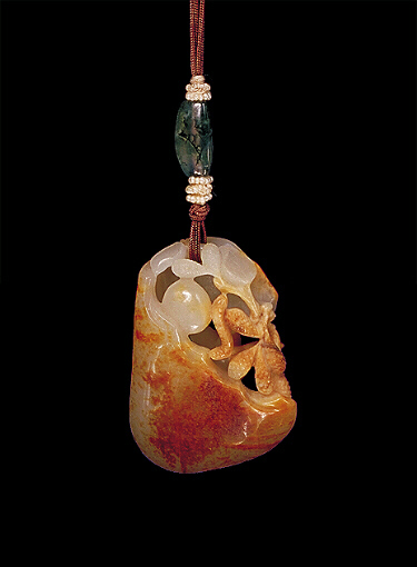 Reverse: Nephrite pendant, pierced white and brown russet skin carved with a butterfly and a silk worm around mulberry leaves and fruit.