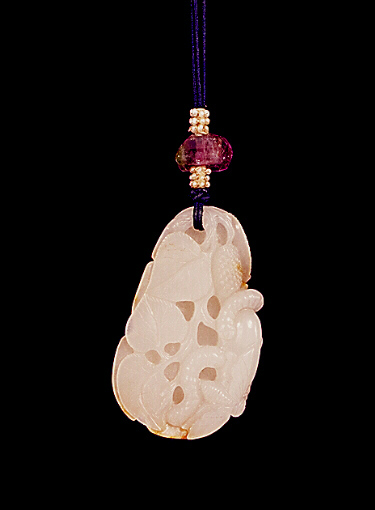 Reverse: Nephrite pendant, white with russet skin carved with leaves and a bee, the inside carved with silk worms, moths, mulberry leaves and fruit.