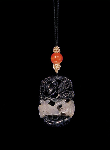 Reverse: Nephrite pendant, mutton fat white with black, carved with two butterfly and a bee with a mulberry fruit and leaves above.