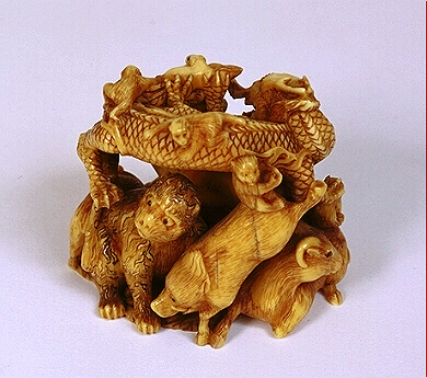 Reverse: Okimono of All The Zodiac Animals in ivory