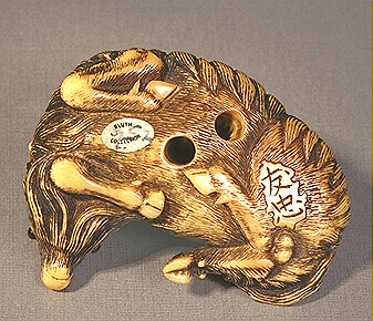 Reverse: Ivory Goat Netsuke