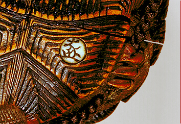 Close-Up: Carved Wood Tortoise inro inlaid ivory plaque