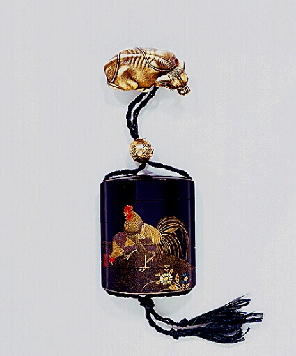 Japanese inro of a cock and hen with an ivory netsuke.