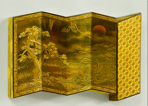 Japanese lacquer: Togidashi Kobako in the form of a six fold screen of a pine tree and a turbulent lake.