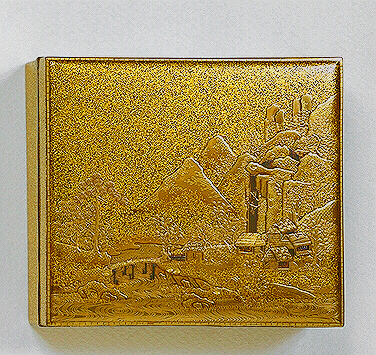 Japanese lacquer Kogo decorated in hiramakie: a mountainous landscape, huts, a waterfall, river, pine and weeping willow trees, inlaid in gold, silver and aogai.