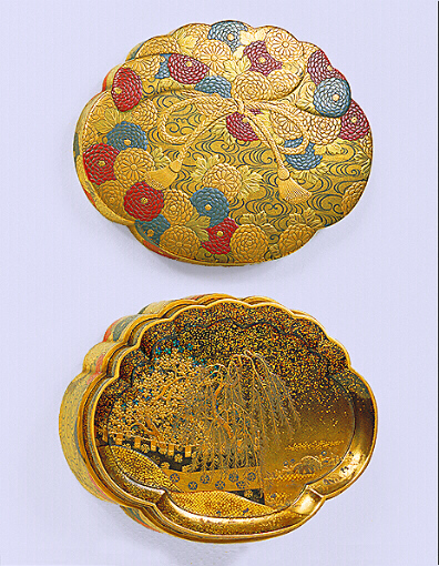 Japanese lacquer: A Kashibako in the form of a tied sack decorated all over with chrysanthemums in gold, red, and silver takamakie.