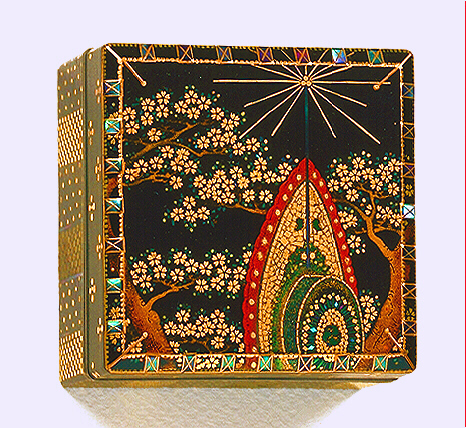 Japanese lacquer: A small Kogo of square form, with Somada style decoration all over. The cover is decorated with a Bugaku drum, and a blossoming cherry tree, in sheet gold.