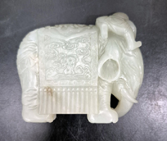 Reverse: Nephrite white/celadon carved as a boy with an elephant. 